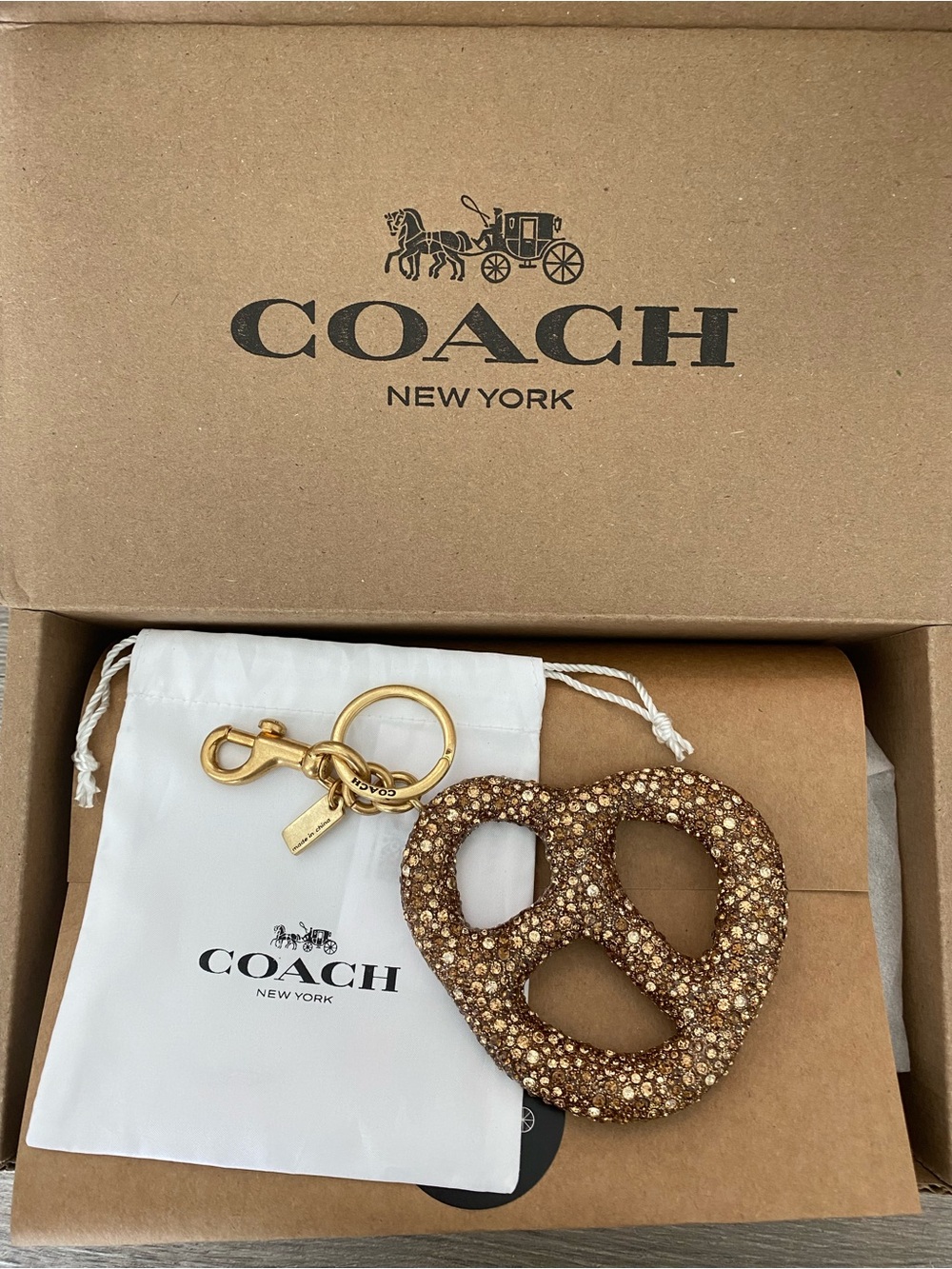 COACH Gold Crystal Pretzel Keychain Charm